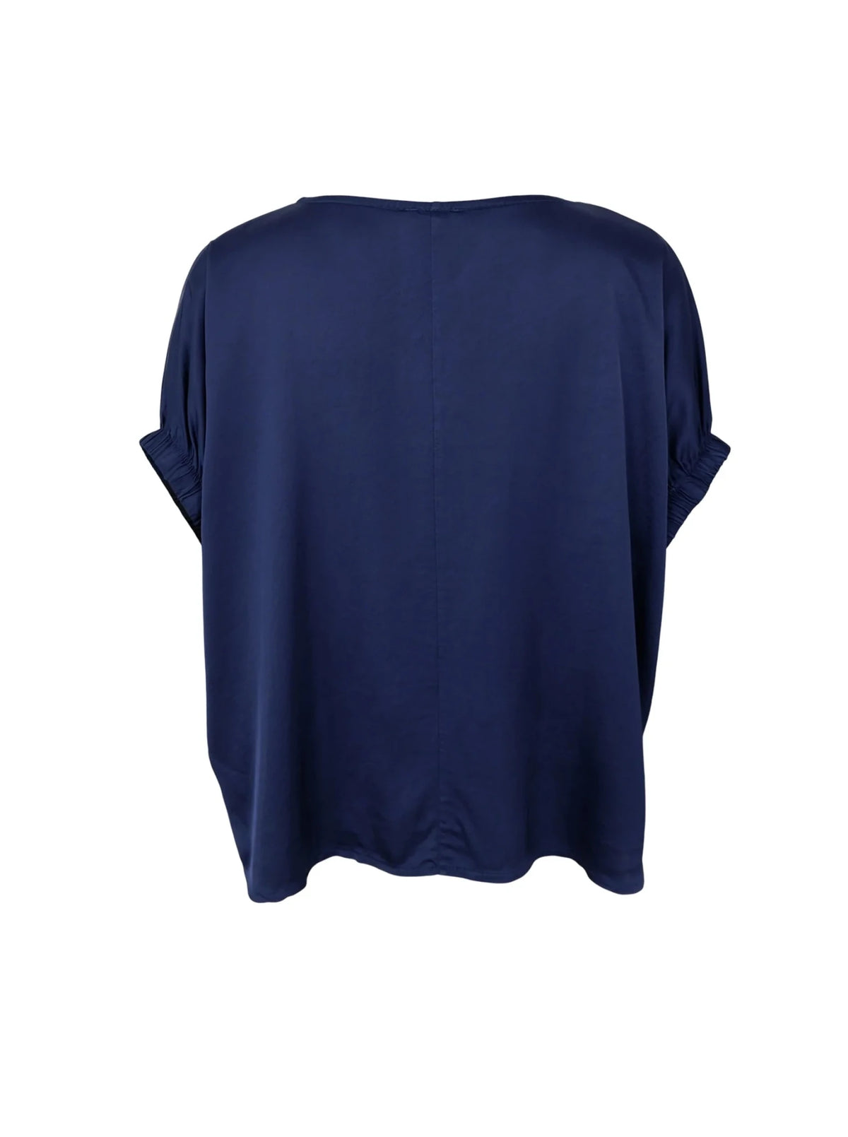 Den mørkeblå Mabel-bluse set bagfra med løs pasform, opsmøgede ærmer og feminine detaljer.