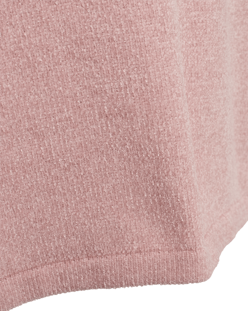 Nærbillede af Freequents Tempo Rosa-stof, lys mauve med en blød, lodden overflade og et diskret ribmønster.