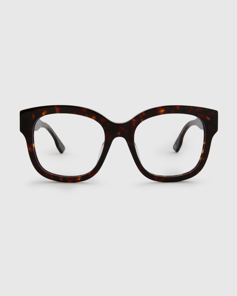 GLAS 152277 Kate Brun-briller med mønster og tykke acetatstel, set forfra mod hvid baggrund.